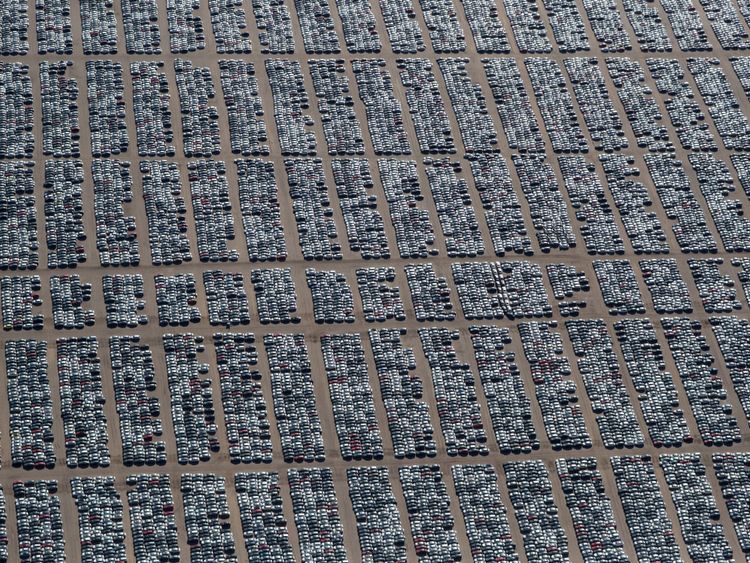 At this distance, it is not immediately obvious that the pattern is made by discarded cars 